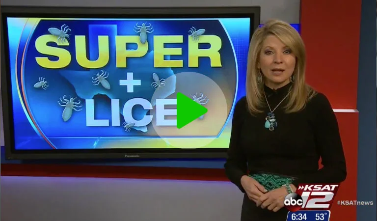 News broadcaster standing in front of a screen that says "Super + lice"